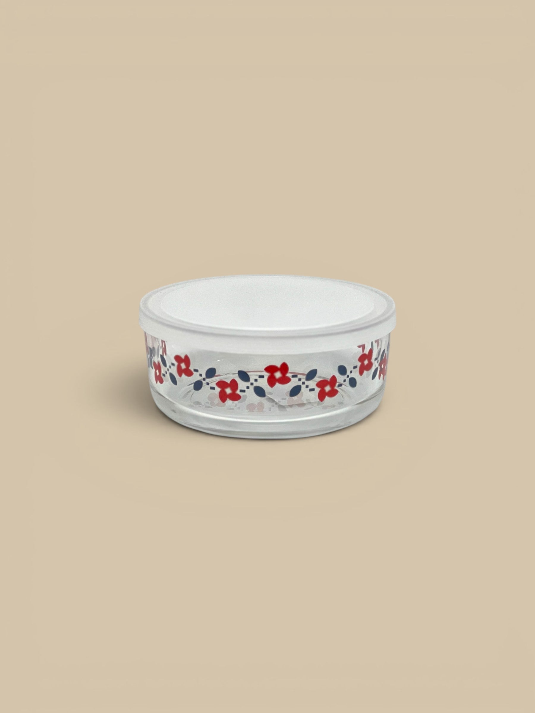 Homestyle Collective glass storage bowl with lid, featuring a vintage floral pattern in red and blue.