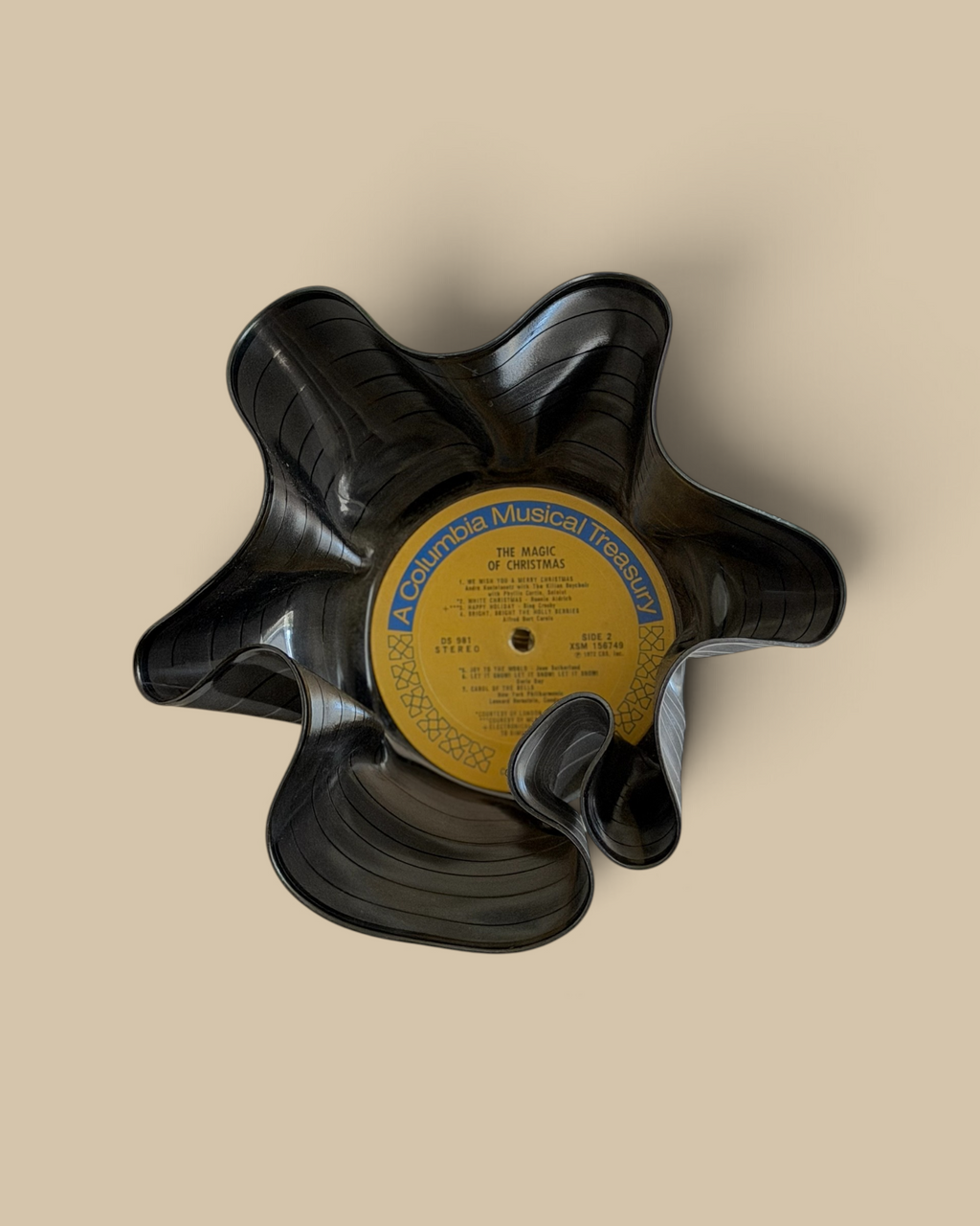Homestyle Collective vintage vinyl record bowl with yellow Columbia label, molded into a unique star-shaped vessel.