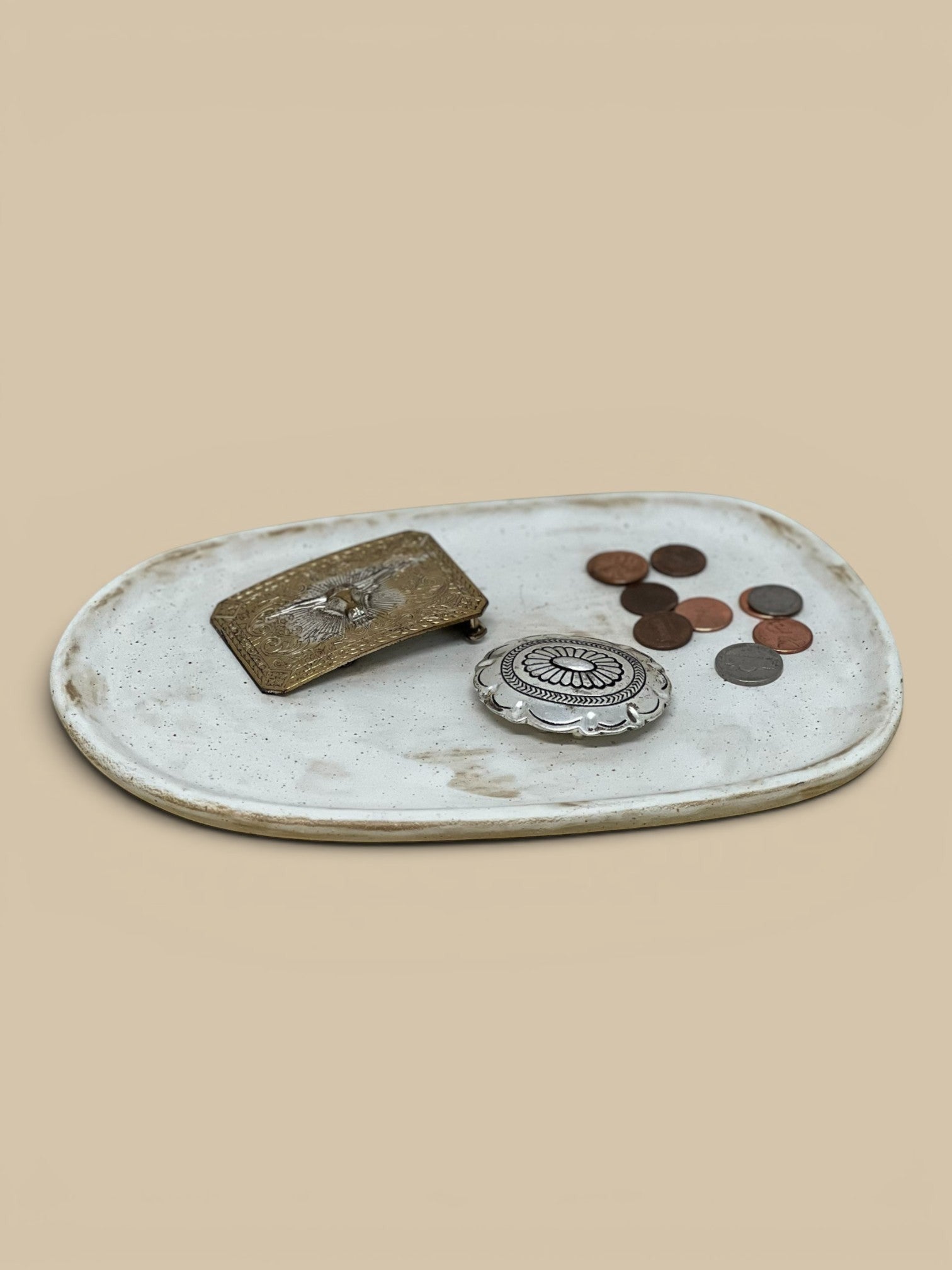 Homestyle Collective Wabi Oval Serving Plate in speckled white ceramic with organic form. Ideal for serving or display.