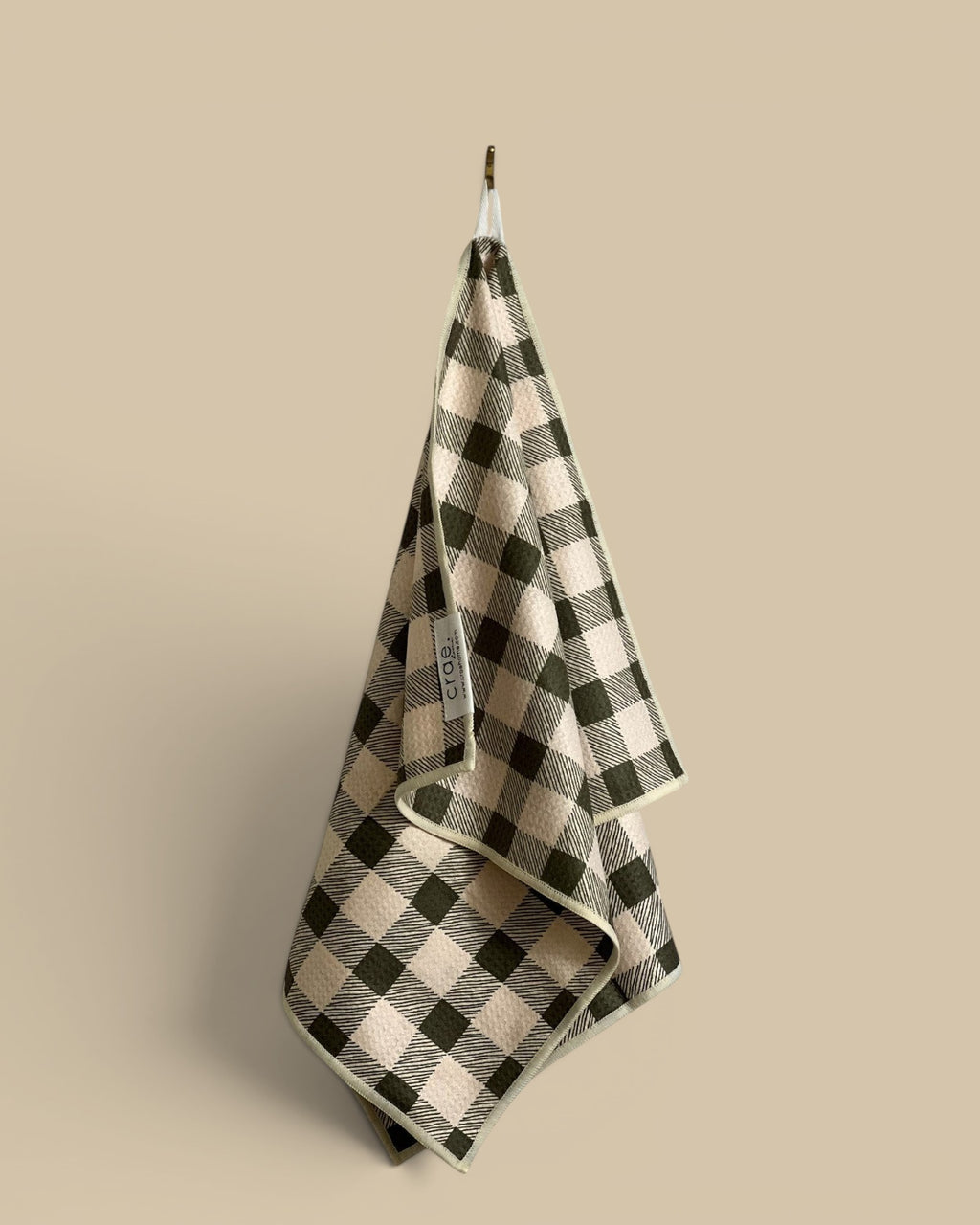 Homestyle Collective beige and green buffalo check waffle weave hand towel