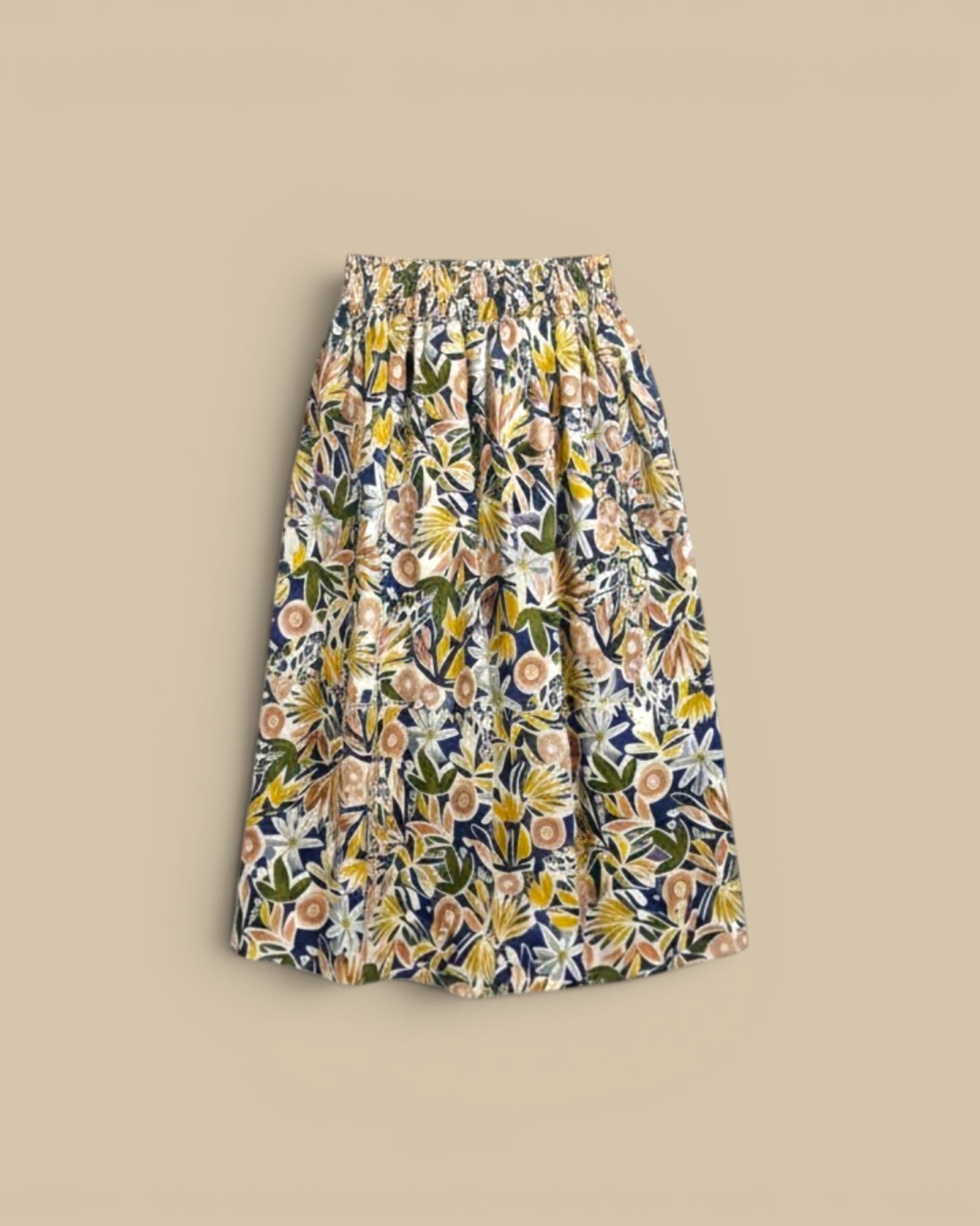 Homestyle Collective watercolor floral A-line midi skirt with elastic waistband and matching sleeveless top.