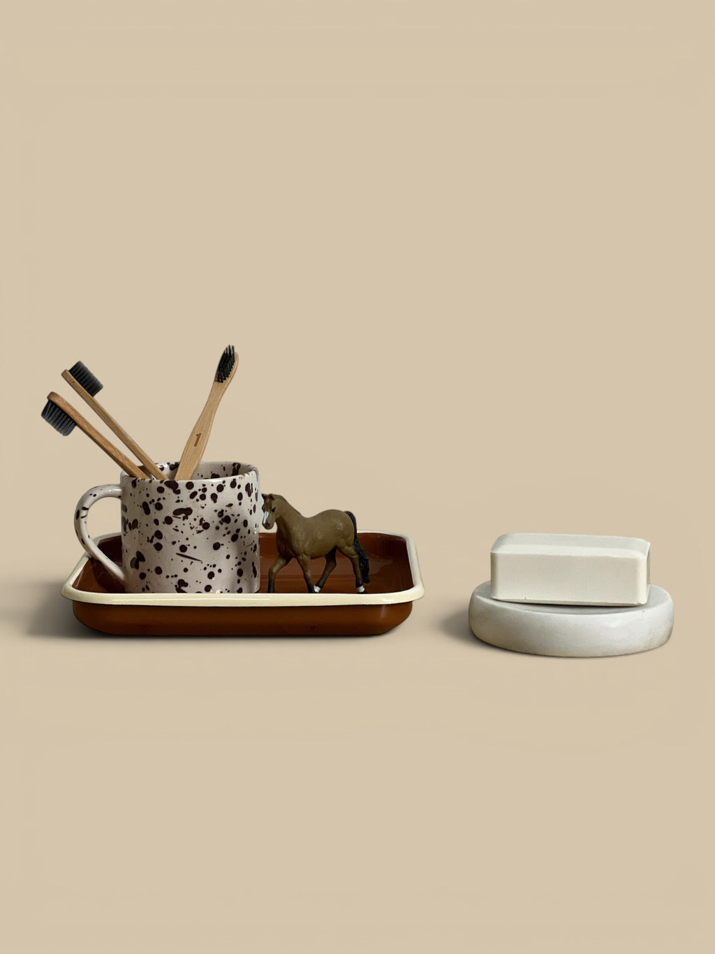 Homestyle Collective modern white marble soap dish with a smooth, sculptural form. Elevates bathroom décor.