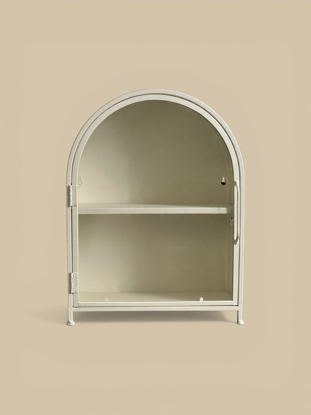 Homestyle Collective textured white metal arched display cabinet with clear glass door and one interior shelf.