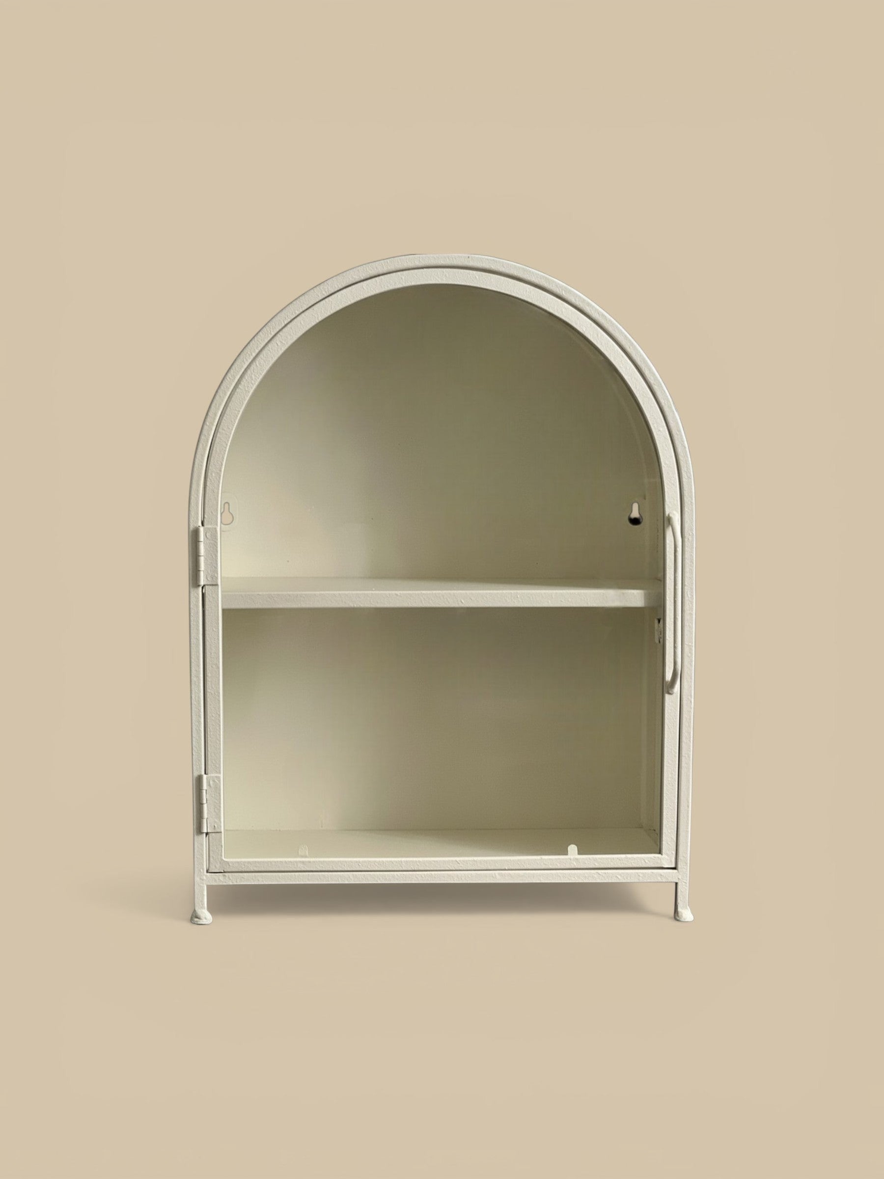 Homestyle Collective textured white metal arched display cabinet with clear glass door and one interior shelf.