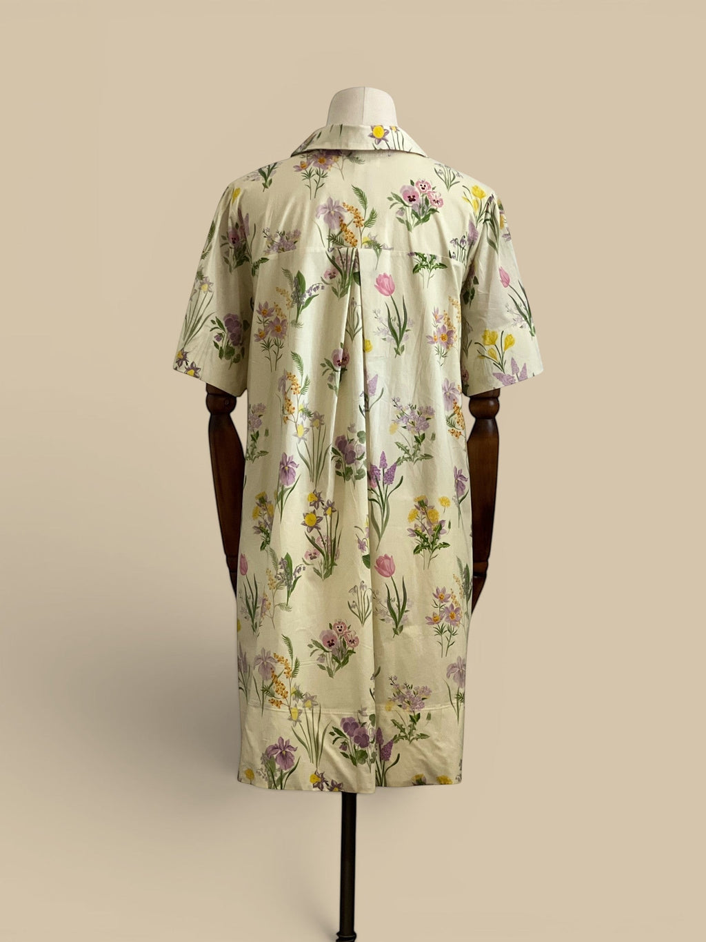 Homestyle Collective yellow floral print cotton mini dress with short sleeves and a collared neckline.