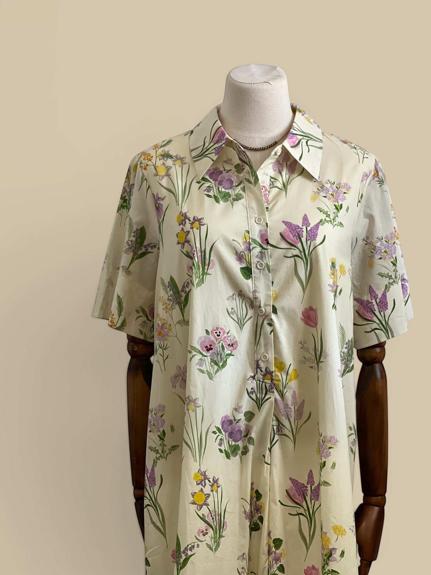 Homestyle Collective yellow floral print cotton mini dress with short sleeves and button-down front.