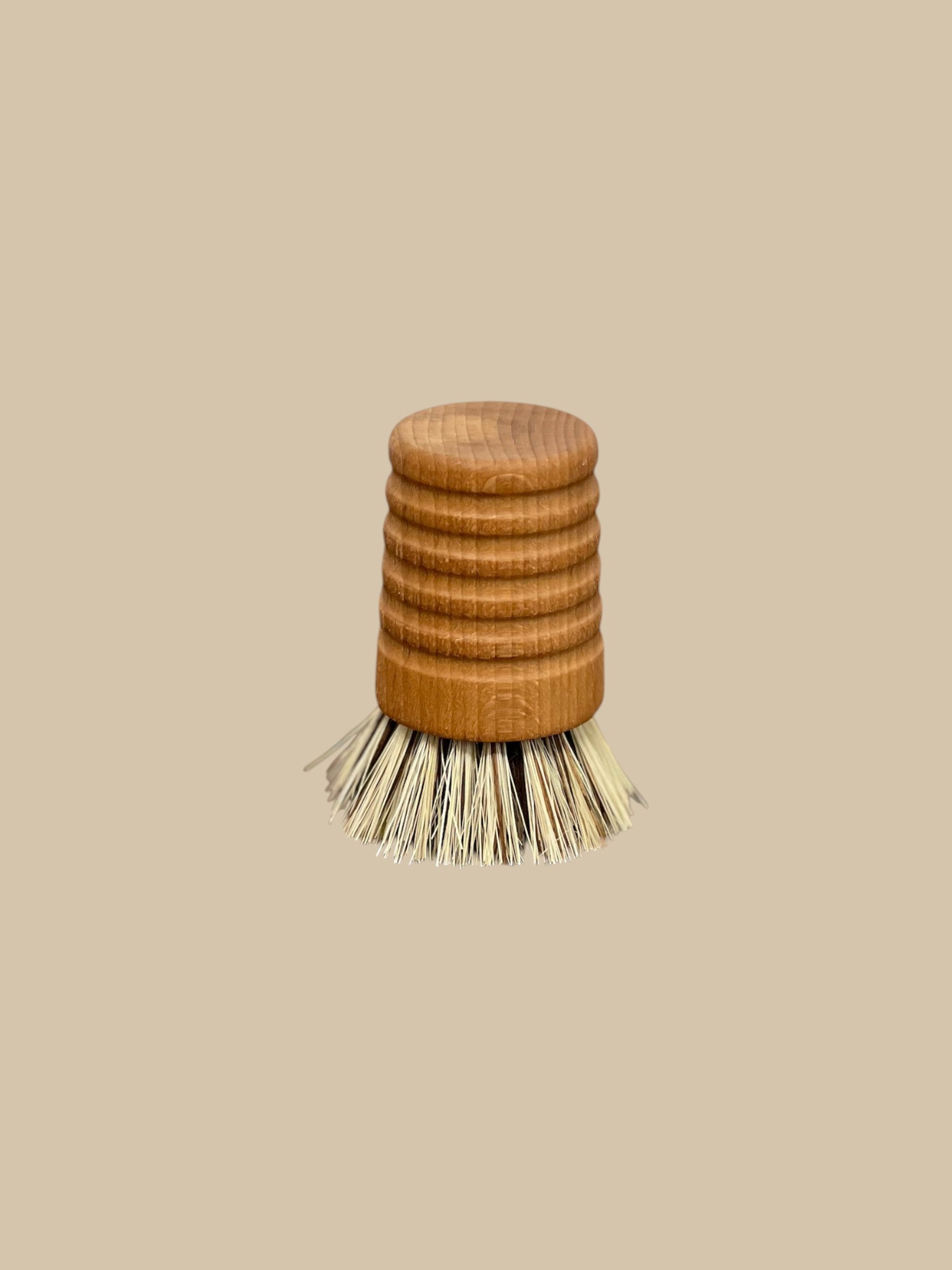 Homestyle Collective Urbana pot and pan brush with ribbed oiled beechwood handle and union fiber bristles.